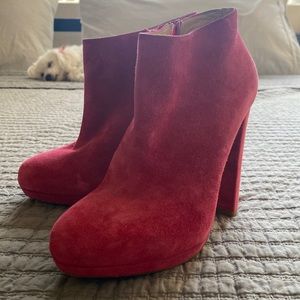 Worn once auth. Christian louboutin. Hot pink booties.size 37 1/2, fits 7.5
